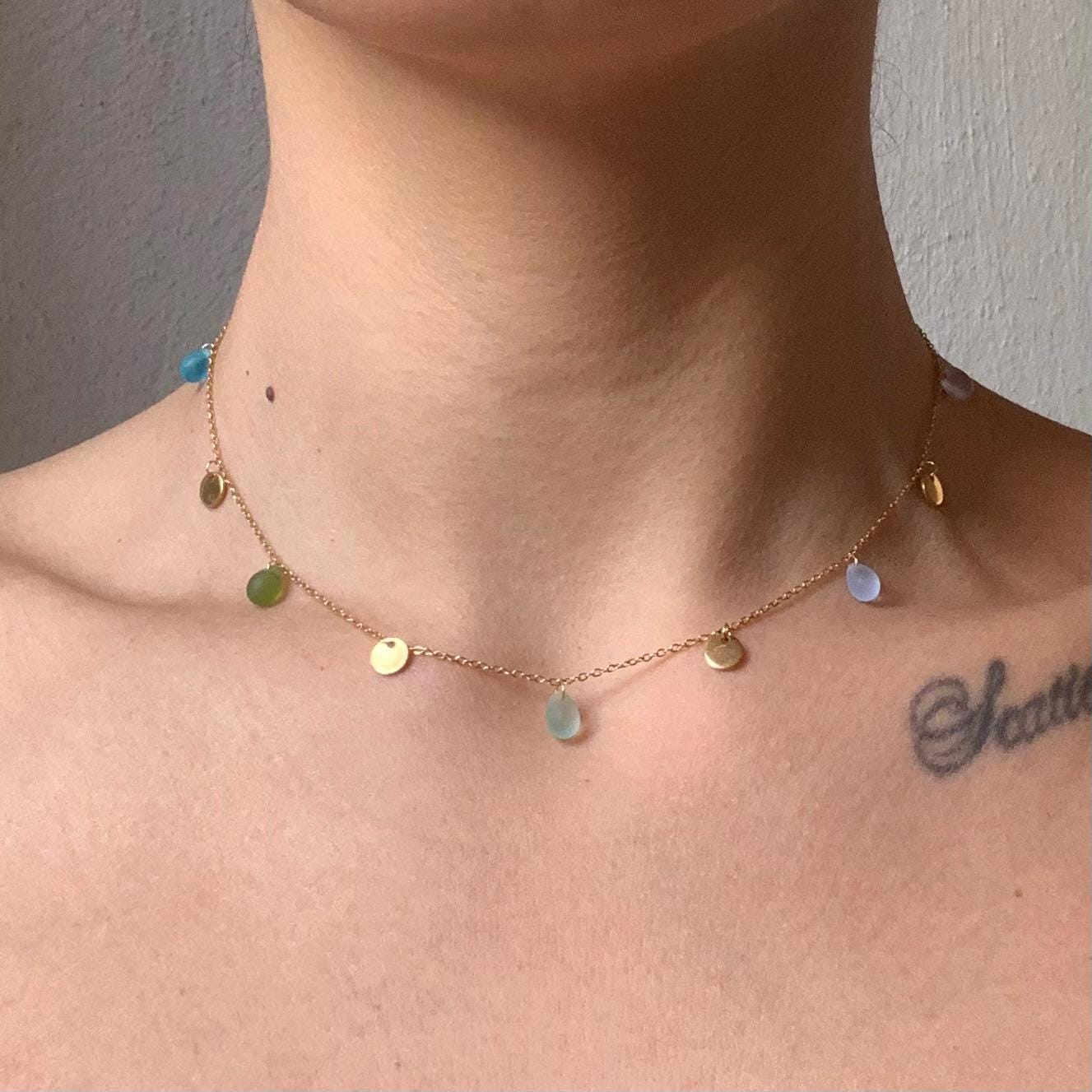 Handmade gold necklace with pastel glass beads, inspired by the vibrant hues of Greek island summers.
