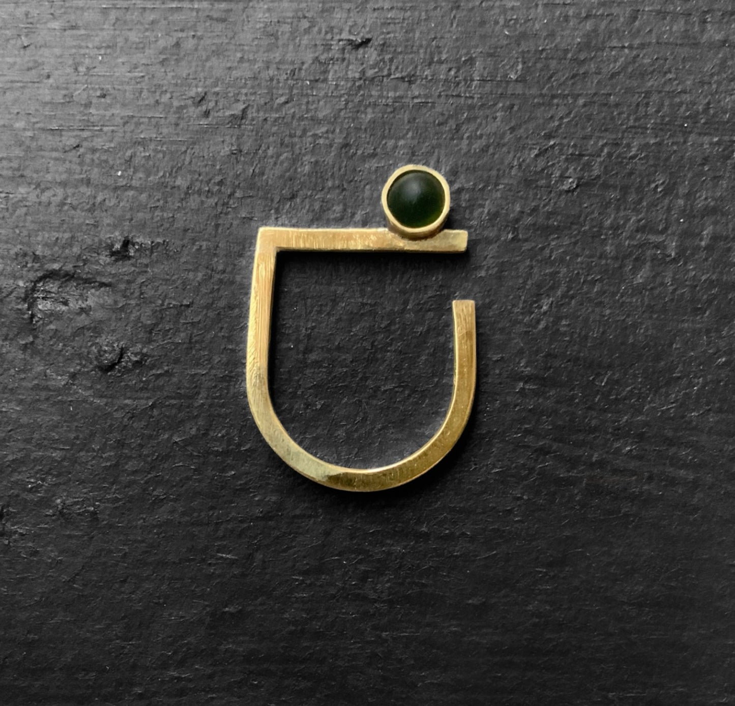 Bauhaus gold ring with a frosted green glass accent, handcrafted for a sleek and contemporary style.