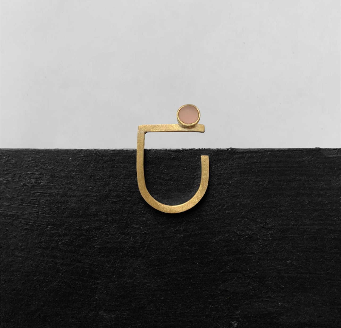Minimalist gold ring featuring a frosted peach glass accent, handcrafted in Greece by Jewelry by Meow.