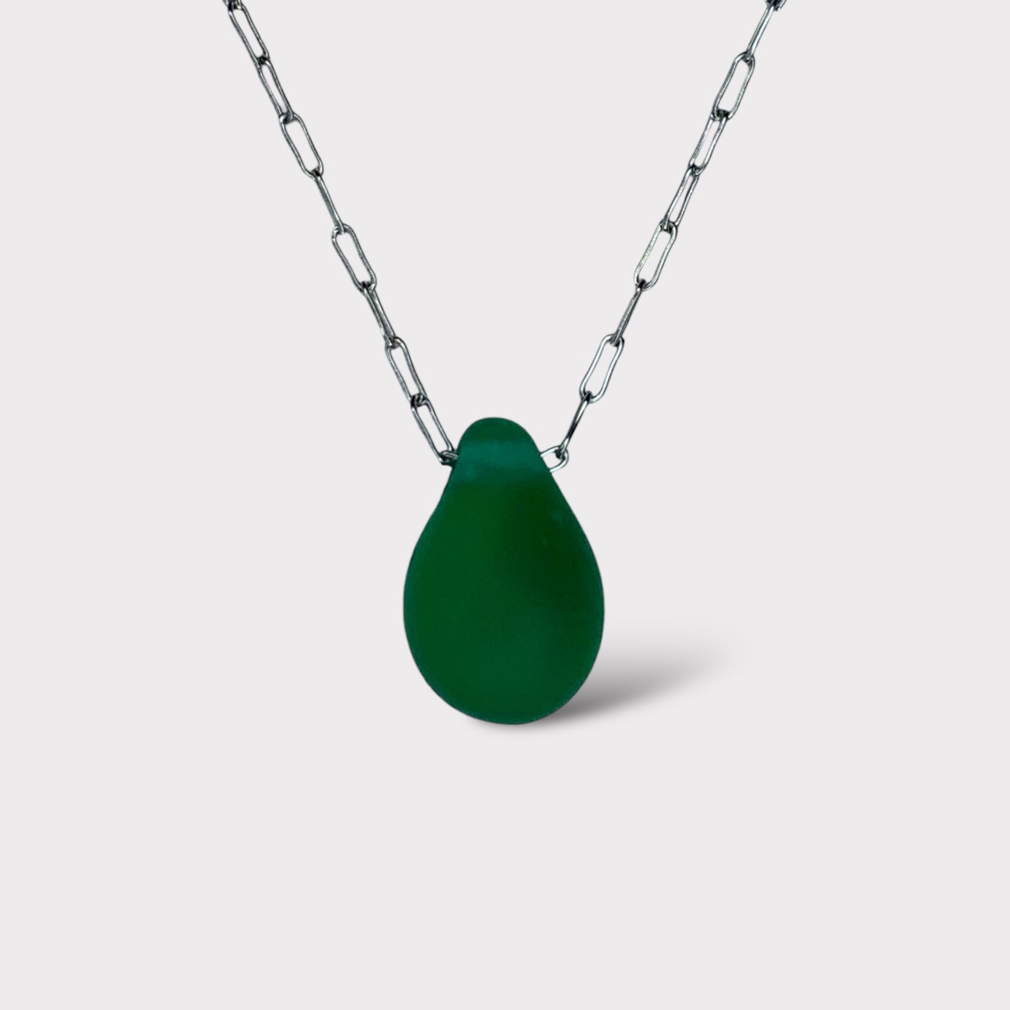  minimalist-necklace-pendant-dropshaped-emerald-matte-sea-glass-silver-stainless-steel-product-photography-jewelry-by-meow-iris-necklaces-iris-collection