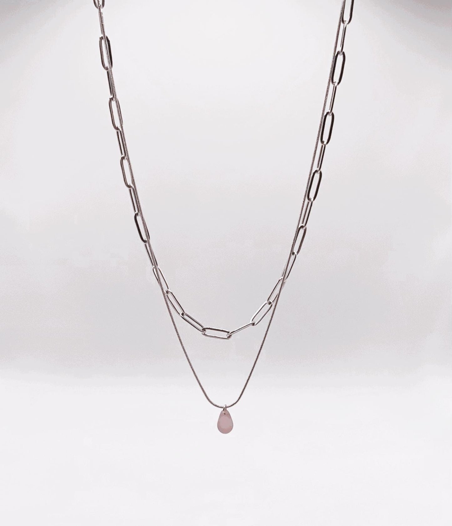Double-layer silver cable chain necklace with a lavender frosted glass pendant, designed for a timeless and versatile style. Handmade for everyday wear or special occasions. Jewelry by Meow.