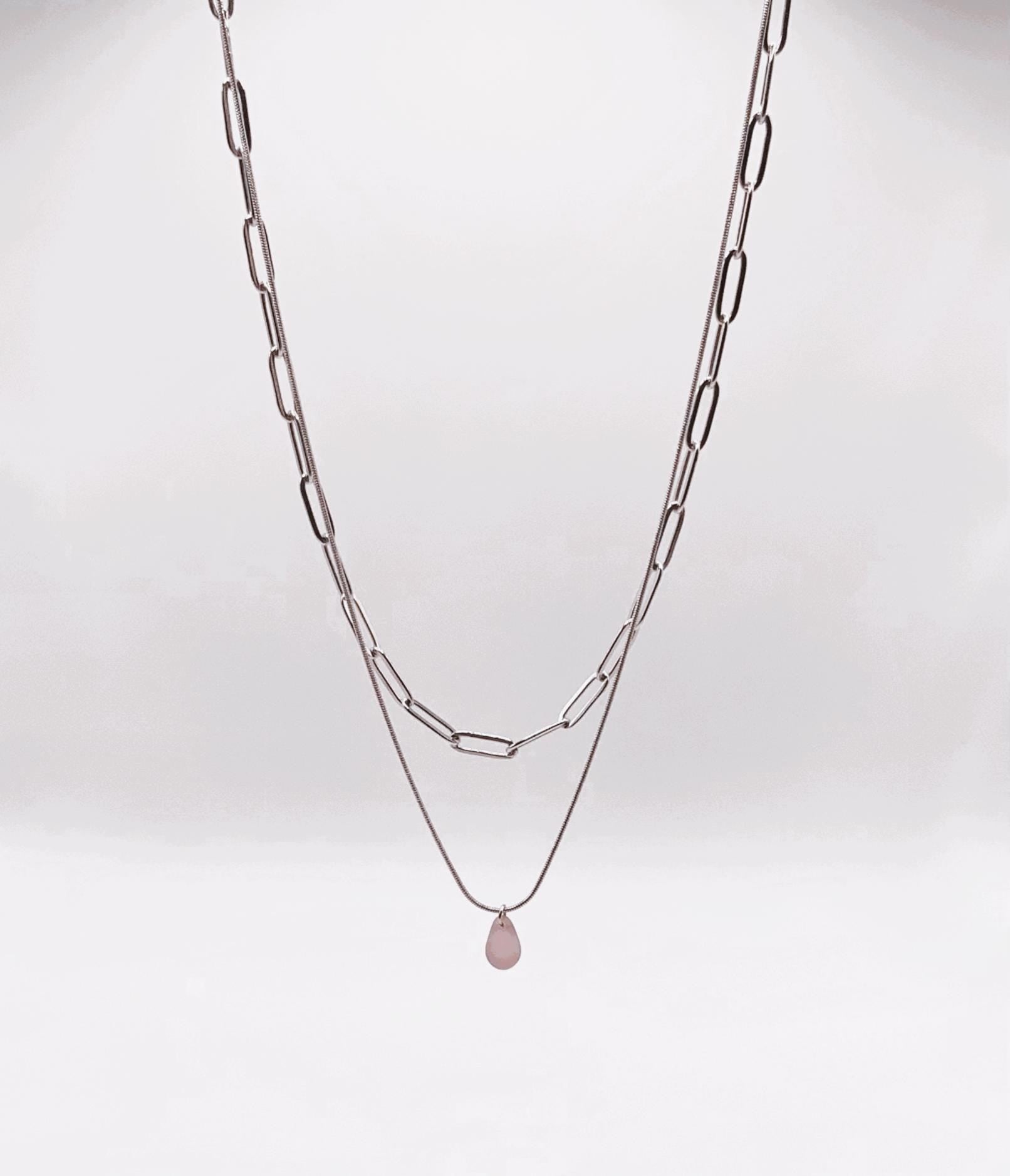 Double-layer silver cable chain necklace with a lavender frosted glass pendant, designed for a timeless and versatile style. Handmade for everyday wear or special occasions. Jewelry by Meow.