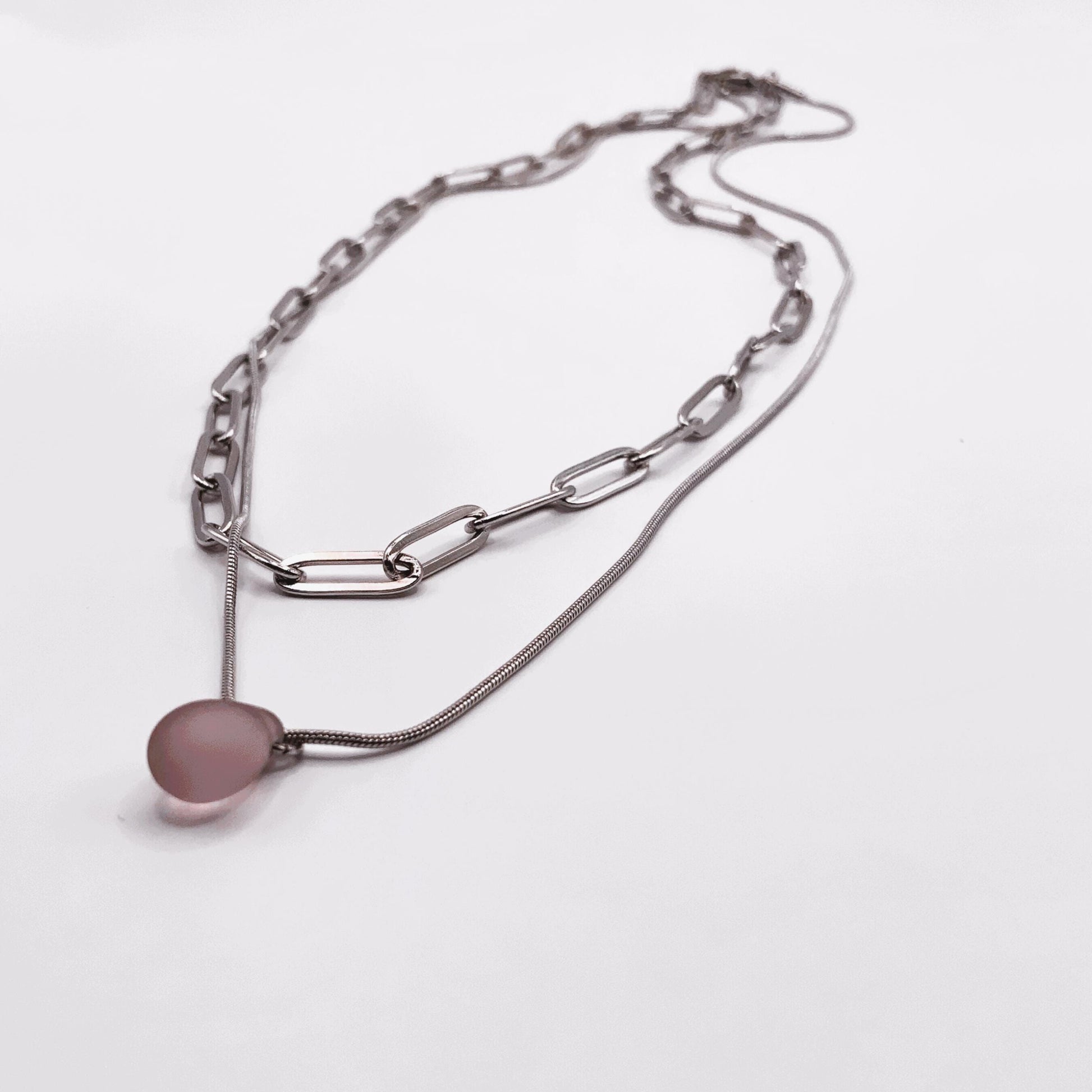 Layered silver necklace featuring a chunky cable chain and a sleek snake chain, finished with a soft lavender frosted glass teardrop pendant. A handcrafted, minimalist design perfect for modern every day.